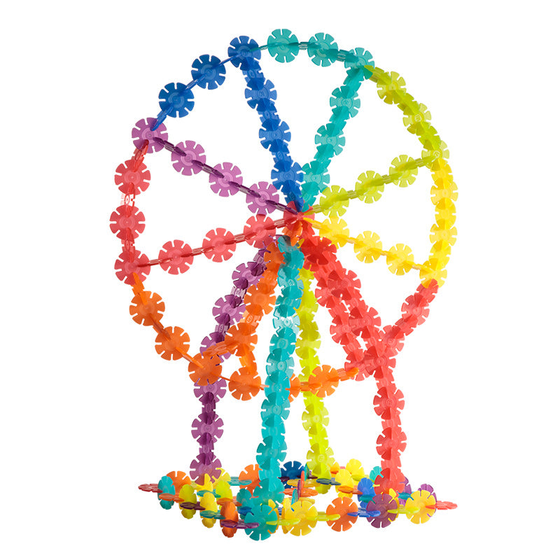 Brightly colored snowflake-shaped plastic connectors for 3D building and construction