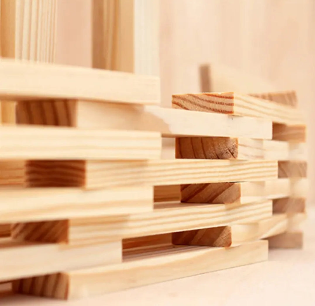 Various creative structures made from wooden building planks – Improves spatial awareness and logic